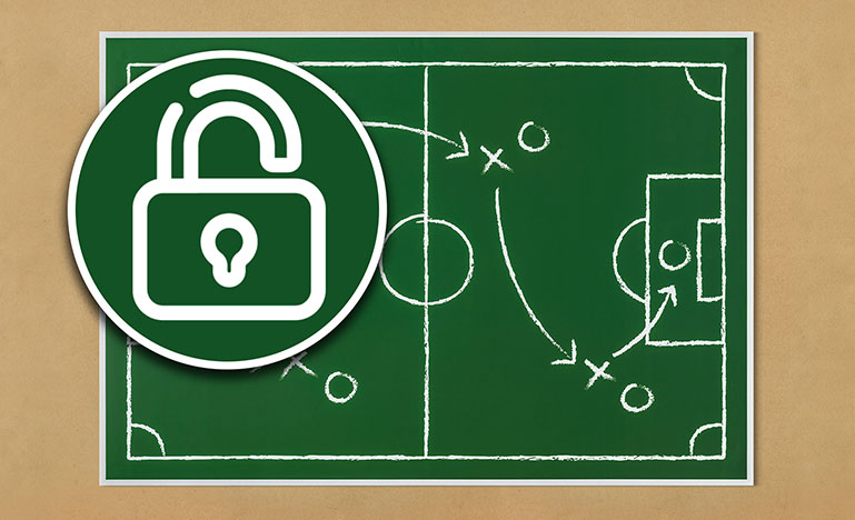 A magnifying glass with a lock in the middle hovering over a chalkboard with a soccer pitch drawn on it.