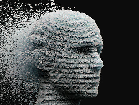 A stoic human face comprised of pixels. 