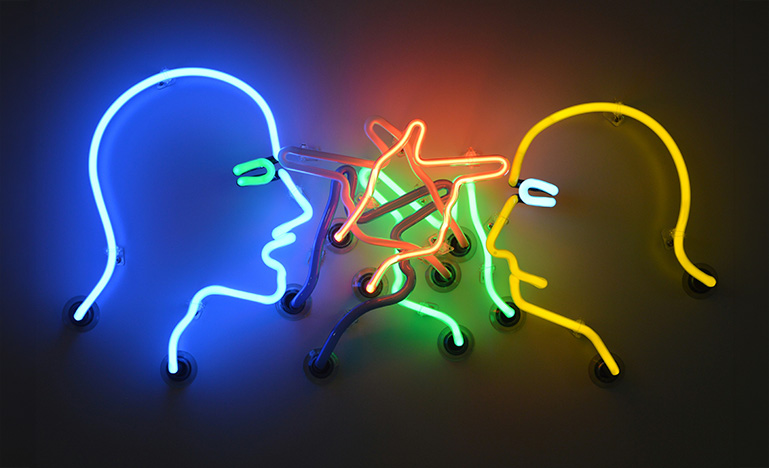A neon sign of two people arguing. 