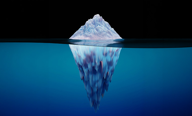 Cross-section view of an iceberg floating in the ocean. 