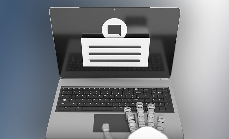 A robot hand starting to type on a laptop. 