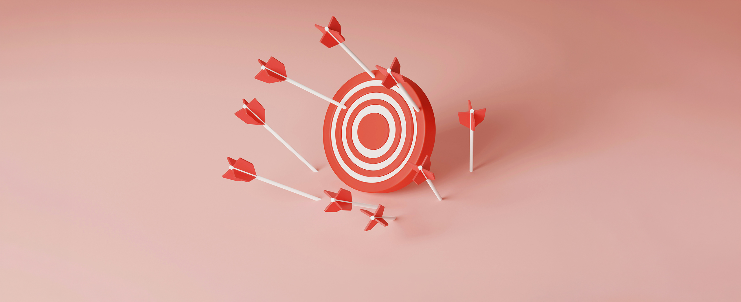 Several arrows landing around a target, all missing the bullseye.